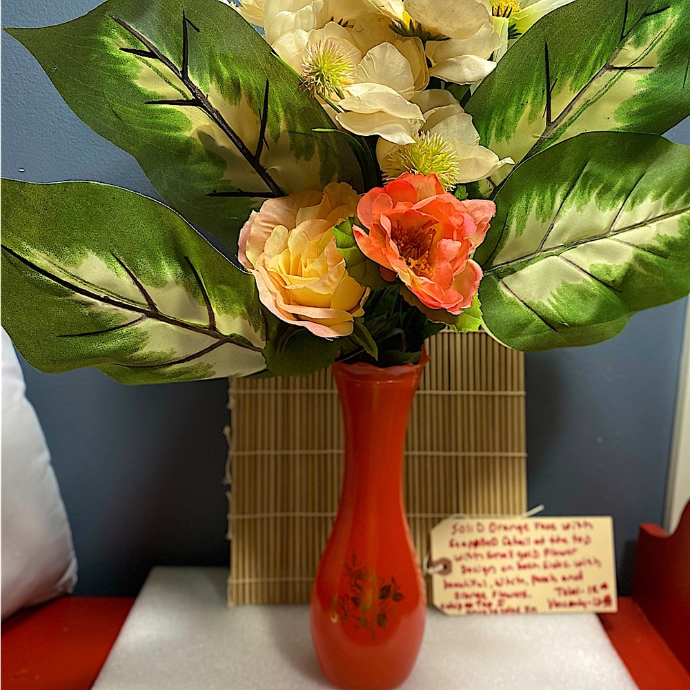 Beautiful red satin with gold American rose emblem.with orange ,white magnolias